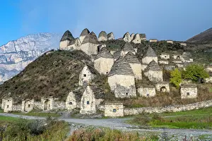 Dargavs Burial Site Drucke: Historic structures stand on the hillside in Dargavs