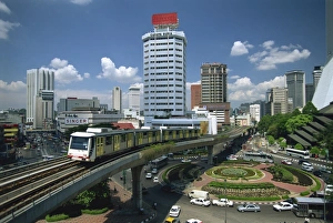 Kuala Lumpur Urban Landscape Drucke: The Light Rail Transit system with the skyline of