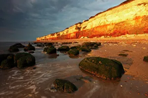 English Coastline Drucke: Midsummer evening sunlight on cliffs at Hunstanton
