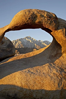 Morning Light On Rock Formations Drucke: Mobius Arch and Eastern Sierras at first light, Alabama Hills, Inyo National Forest