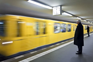 Public Transportation Germany Drucke: Moving train pulling into modern subway station, Berlin, Germany, Europe