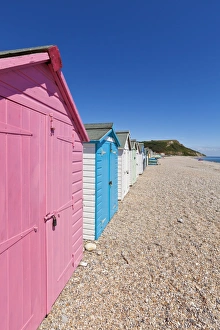 Drucke von Farbenfroh bemalte Strandhütten in Seaton einer kleinen Küstenstadt am Devon-Küstendorf auf der Juraküste Weltkulturerbe des Vereinigten Königreichs Europa Bilder Datiert 2011 Juli: Farbenfroh bemalte Strandhäuser in Seaton einer kleinen Küstenstadt auf der devonischen Kulturküste und dem