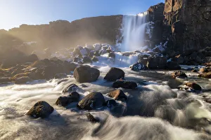 Waterfall Photography Tips Drucke: Oxararfoss waterfall at sunset during spring, Sudurland, Iceland, Polar Regions