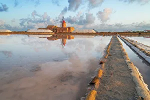 Sicily Windmill Photography Drucke: Reflection of the windmill in the salt flats at dawn