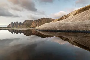 Senja Island Scenery Drucke: Reflections of clouds, rocks and Devil's Teeth Mountain in evening sunlight