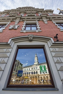 Riga Latvia Architecture Drucke: Reflections of downtown in shop window, Riga, Latvia, Europe