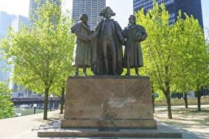 American Cultural Heritage Sites Drucke: Robert Morris, George Washington, Haym Salomon Memorial statue stands by the Chicago River