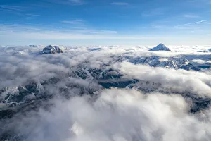 Dolomites Aerial View Drucke: Sorapis group and Antelao emerging from clouds, aerial view, Dolomites, Belluno province