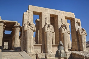 North Africa Travel Destination Drucke: Four statues of Osiris, Hypostyle Hall, The Ramesseum (Mortuary Temple of Ramese II)