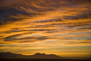 Polar Regions Scenery Drucke: Sunset with deep orange clouds