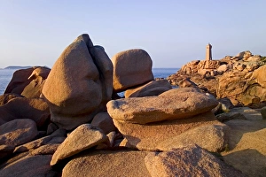 Cote De Granit Rose Rocks Drucke: Sunset over rocks and lighthouse at Pars-Kamor, Ploumanach, Breton Corniche