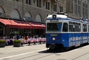 Outdoor Cafe Scene Drucke: Tram and restaurant