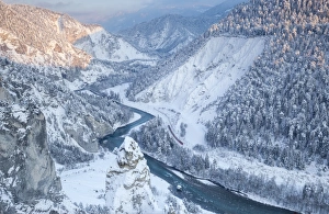 Graubunden Travel Destination Drucke: Transit of the Red Train in the deep Rhine Gorge, Rhein Gorge (Ruinaulta), Flims