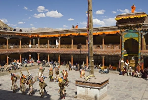 Ladakh Tourism Destination Drucke: View from above of monastery courtyard with monks in