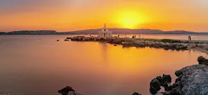Ionian Islands Scenery Drucke: View of Saint Theodore Lighthouse at sunset