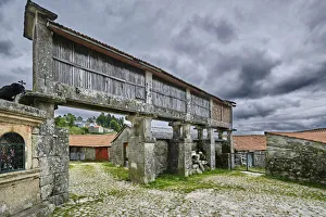 Minho Region Portugal Drucke: A big granary (espigueiro) to store the corn away from the mice