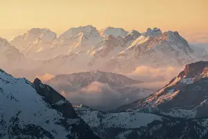 Italian Alps Scenery Drucke: The Dolomites mountain range taking the first rays of sun of the day