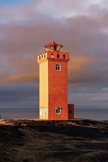 Icelandic Landscape Photography Drucke: Svortuloft lighthouse at sunset