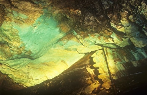 Ashley Cooper Photographer UK Drucke: Copper staining in Coniston Copper mines, long since abandoned in the Lake District, UK