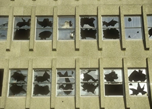 Ashley Cooper Photographer UK Drucke: Smashed windows in a derelict building in oldham, lancashire, UK