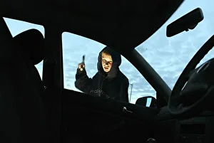 Car Photo Library Images Drucke: Young Car Thief (Posed by model model
