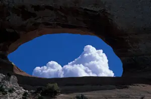 Cloud Formations In The Sky Drucke: Clouds - General Cloud formation through Wilson Arch - Utah, USA