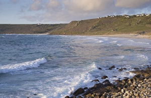 Cornish Coastal Views Drucke: View of waves and coastline in evening sunlight