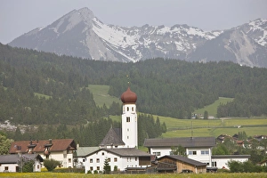 Rural European Countryside Drucke: AUSTRIA, Lechtaler Alps, Heiterwang. Village view with Austrian Alps, springtime