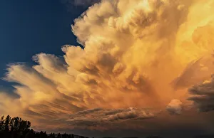 Danita Delimont Images RF Drucke: Dramatic storms clouds at sunset in Whitefish, Montana, USA