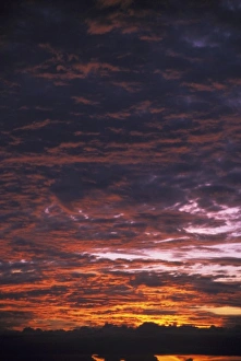 Tranquil Outdoor Scene Drucke: Sunset over clouds