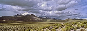 Altiplano Landscape Photography Drucke: Thunderstorm clouds over the vulcano Isluga