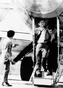 Middle East Conflict History Drucke: An armed hijacker (left)
