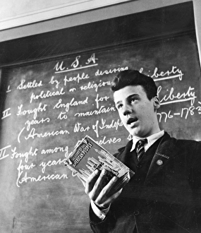 Vintage Classroom Decor Drucke: CLASSROOM, c1940. A prefect at the head of a classroom, reading from The History