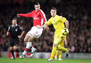 Robin van Persie (Arsenal) Chris Burke (Cardiff)