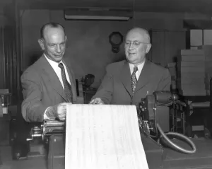 Businessmen In Suits Drucke: Executives Viewing Data Sheets