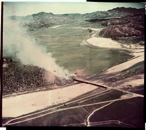 Military Aircraft Photography Drucke: Ammunition Truck Exploding on Bridge