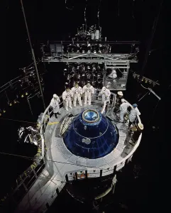 Space Exploration Research Drucke: Astronauts Waiting Outside the Command Module