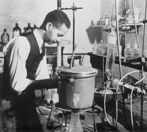 Laboratory Equipment Setup Drucke: Chemist Experimenting at Lab