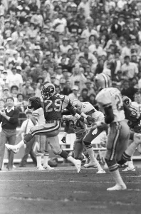 African American Athletes Drucke: Eric Dickerson Running for a Touchdown