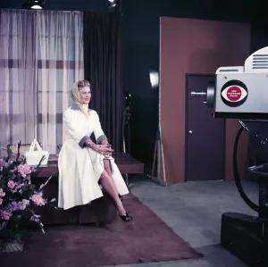 Joan Caulfield Sitting on Table
