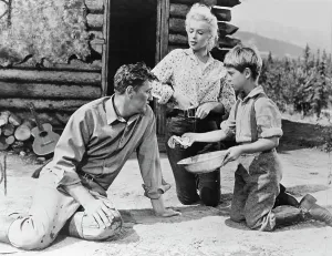 Marilyn Monroe, Robert Mitchum und Tommy Rettig im Fluss der Verlorenen Seelen