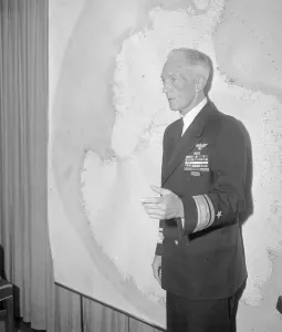 Exploration History Drucke: Richard E. Byrd in Front of Map