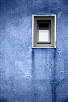 Vertical Outdoor Photography Drucke: Blue wall with a window