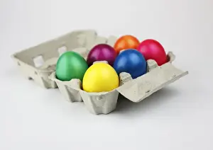 Traditional Easter Egg Display Drucke: Colourful Easter eggs in an egg box