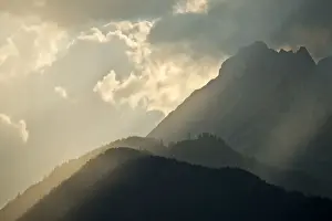 Atmospheric Evening Sky Photos Drucke: Sunset over Mt Bettelwurf, Karwendel Range, Tyrol, Austria