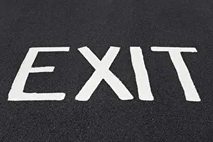 Street Traffic Signs Drucke: Word Exit painted on a road