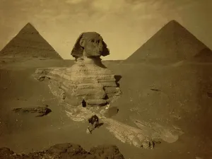 Egyptian Antiquities Photography Drucke: Three men, one with camel, on paw of the Sphinx, two pyramids in background. 1880 (photo)