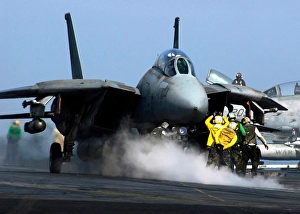 Aircraft Carrier Flight Deck Drucke: An F-14D Tomcat prepares to launch