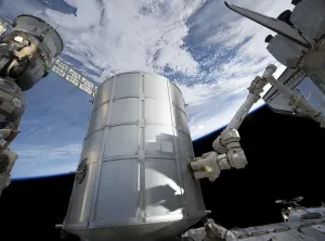 Space Photography Drucke: The Leonardo Permanent Multipurpose Module in the grasp of Canadarm2