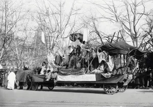 American Culture History Drucke: A parade float passing the U.S